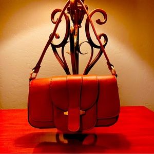 Brand new Time And Thru rust colored leather small purse.